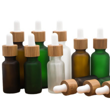 Stock cosmético 10 ml 20ml 30ml 50ml de marrón verde ámbar para el cuidado de la piel CBD botella de aceite esencial de vidrio transparente de bambú suero botellas de suero